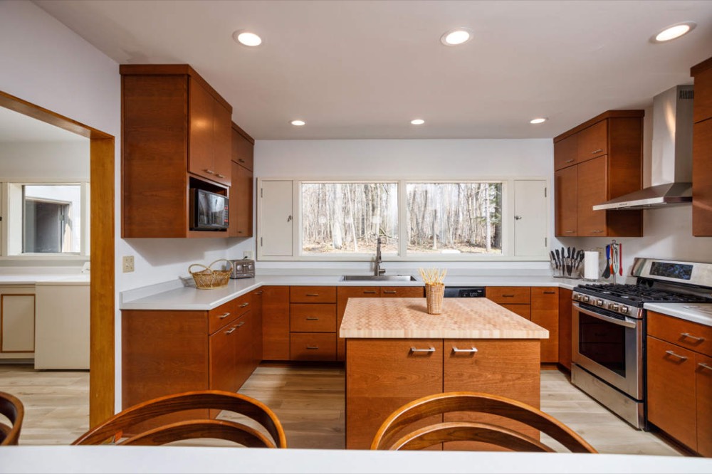 Kitchen with gas range and island